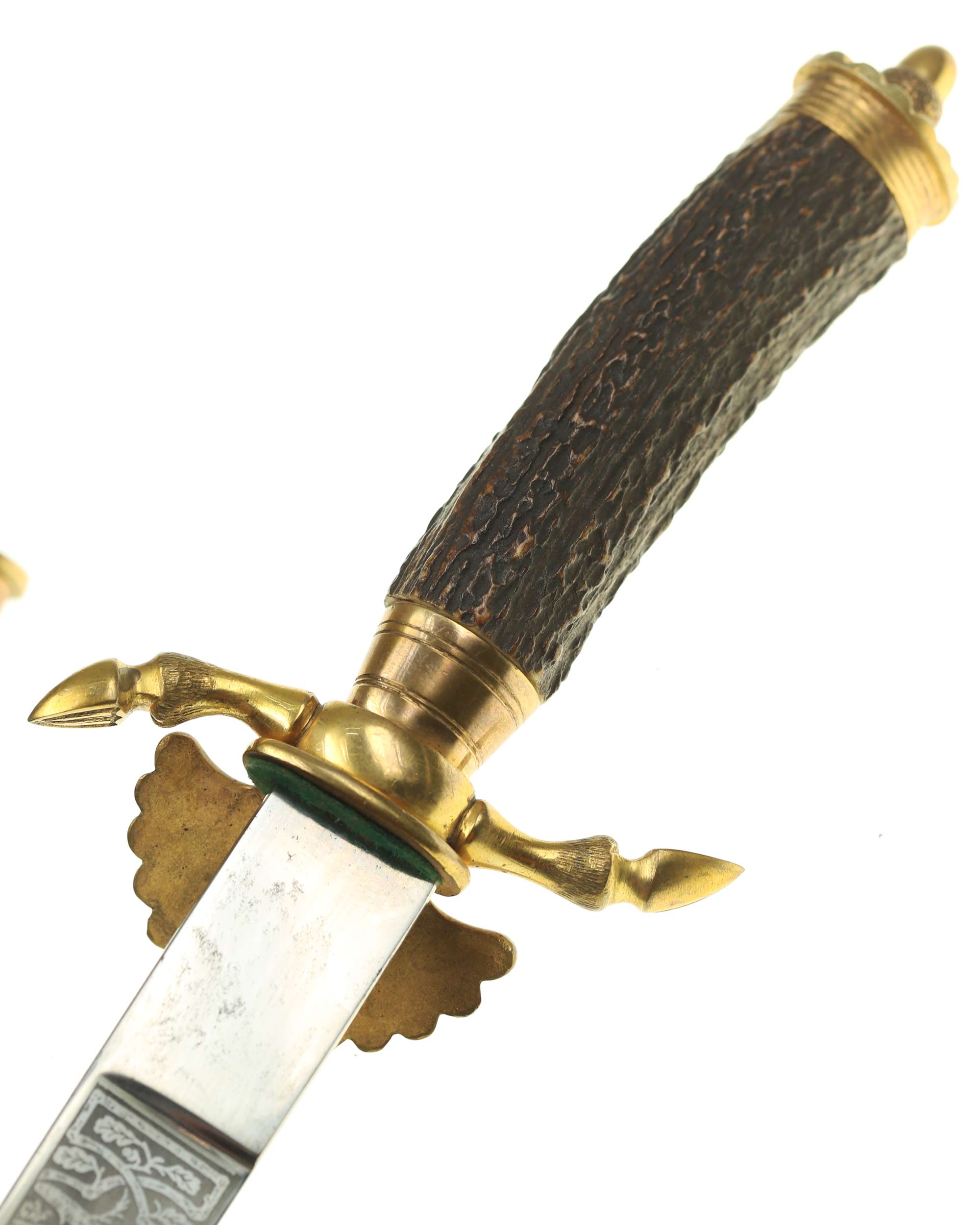 Hunting-themed etching on the blade of the Hunting Cutlass