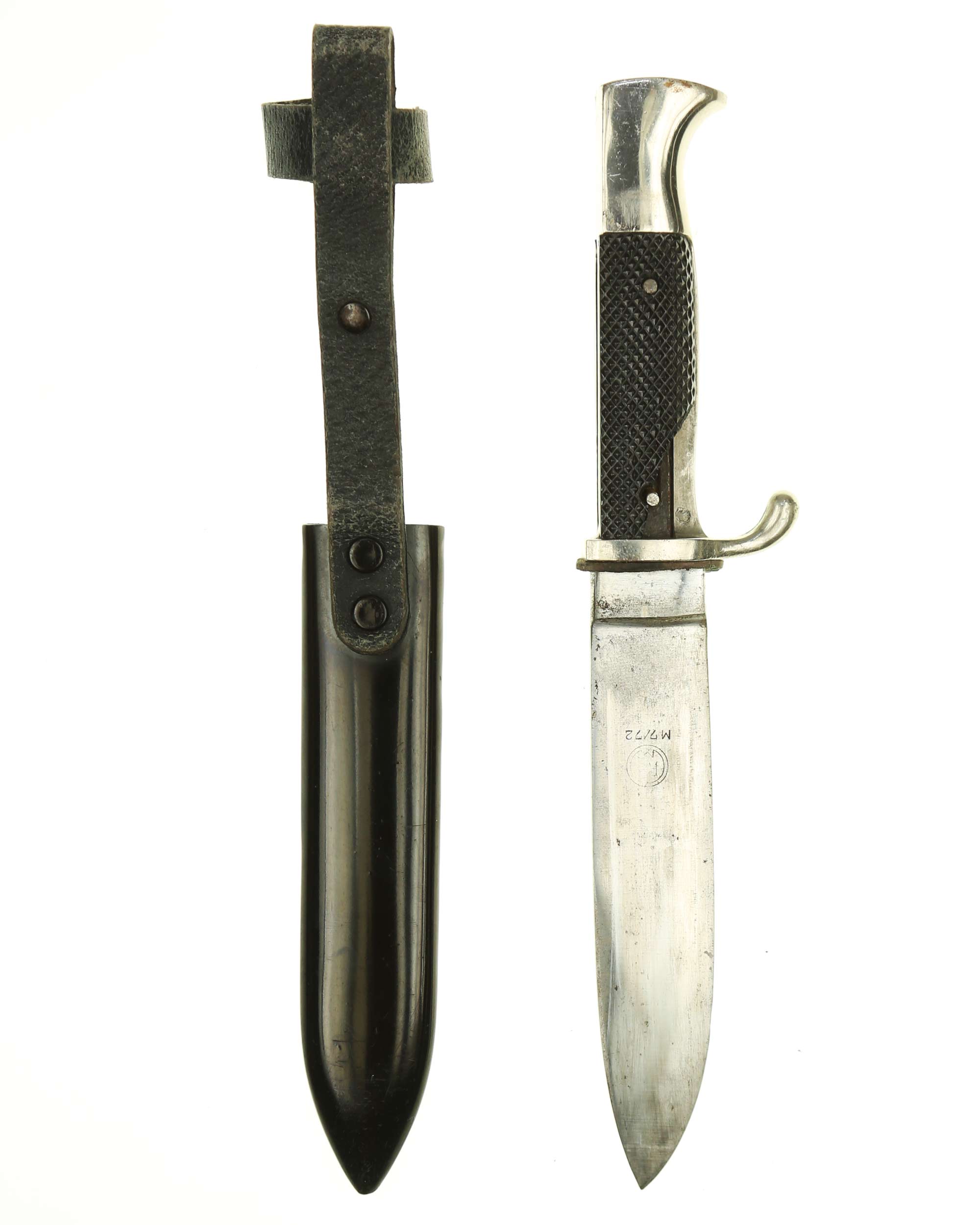 Grip of HJ Knife with black Bakelite grip plate and HJ emblem