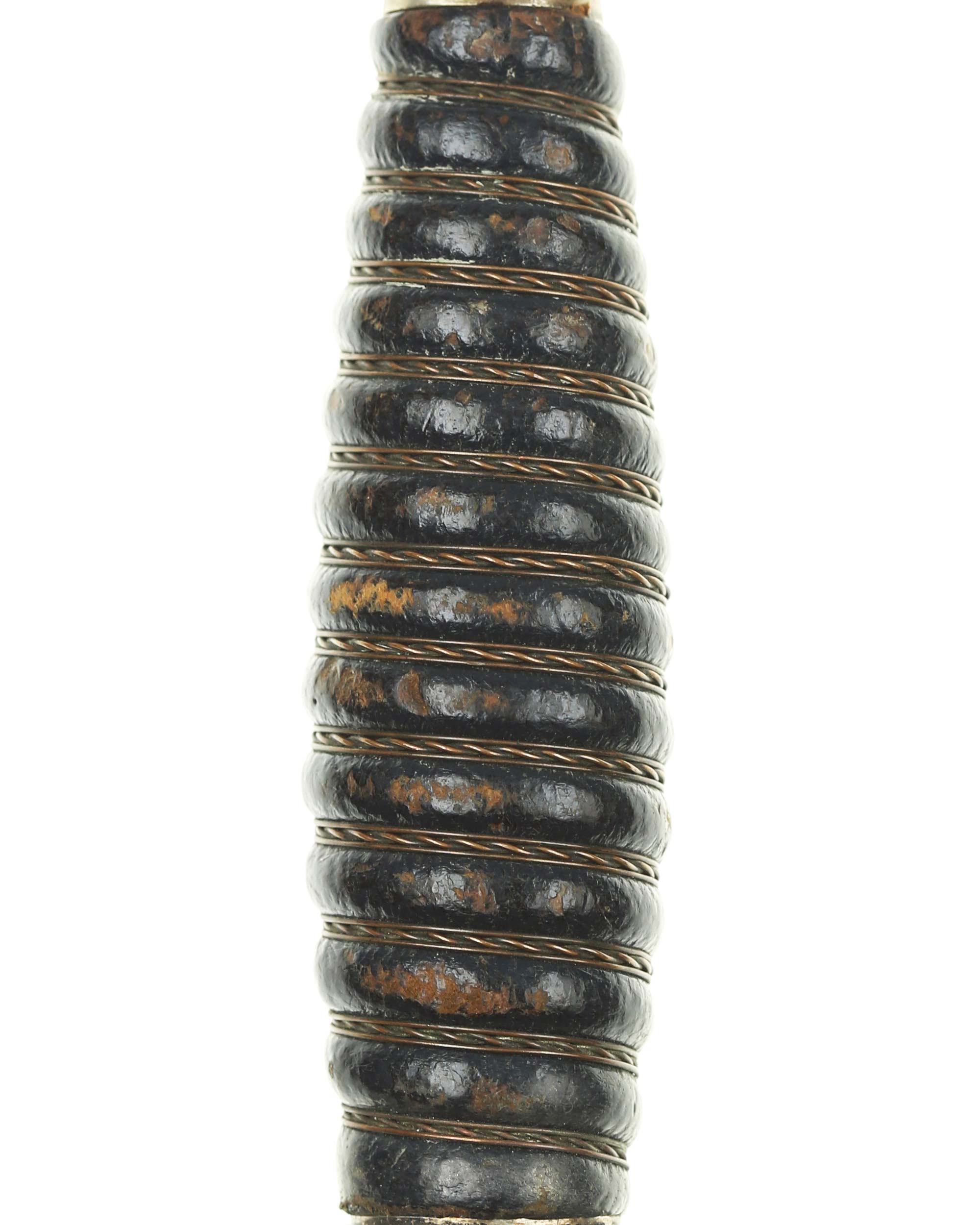 Grip of Luftwaffe Aircrew Dagger M1935 with darkened Saffian leather and triple wire wrapping